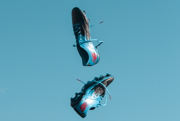 Turquoise football boots